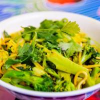 Chaing Mai Noodles Bowl · Eggless wheat noodles and our organic veggie medley in our Thai-coconut yellow curry sauce. ...