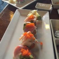 Rockville Roll · Spicy tuna, spicy salmon and crunch, topped with yellowtail. 