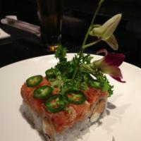 Blue Hawaii Roll · Crunchy lobster salad and cream cheese inside, spicy tuna and jalapeno on top. 
