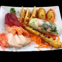 Asian Progression · A sample platter featuring summer roll, spring roll, sashimi, fried dumplings and chicken sa...