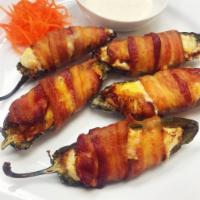 Bacon Jalapeno Popper · Delicious jalapeno stuffed with crab meat, cream cheese, scallions and gooey cheesy filling ...