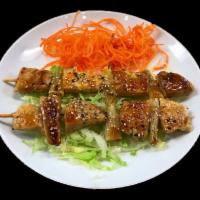 Chicken Yakitori · Diced chicken tenderloin skewered with scallions, grilled and served with a side of teriyaki...