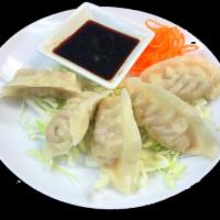 Dumplings · Served steamed or pan-fried with choice of either pork or mixed vegetable filling.