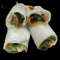Pho Roll · Rice Noodles wrapped with your choice of chicken or beef, bean sprouts, onions, basil and ci...