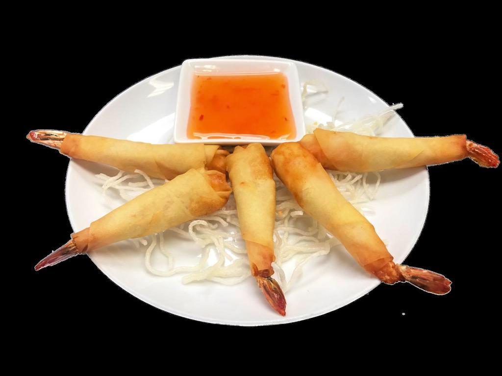 Shrimp in Blanket · Shrimp with chicken stuffing, wrapped in spring roll skin, deep fried and served with a sweet and tangy chili sauce.