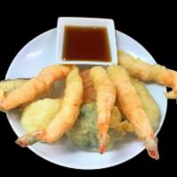 Shrimp Tempura Appetizer · Lightly battered shrimp and assorted vegetable deep fried to crisp golden brown served with ...