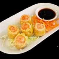 New! Shrimp Shumai · Cantonese dim sum platter filled with a mixture of shrimp wrapped as open-faced dumplings an...