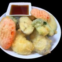 Vegetable Tempura Appetizer · Lightly battered assorted vegetables deep fried to crispy golden brown served with a tempura...