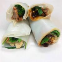 Pho Roll · Rice noodles wrapped with your choice of beef or chicken, bean sprouts, onions, basil and ci...