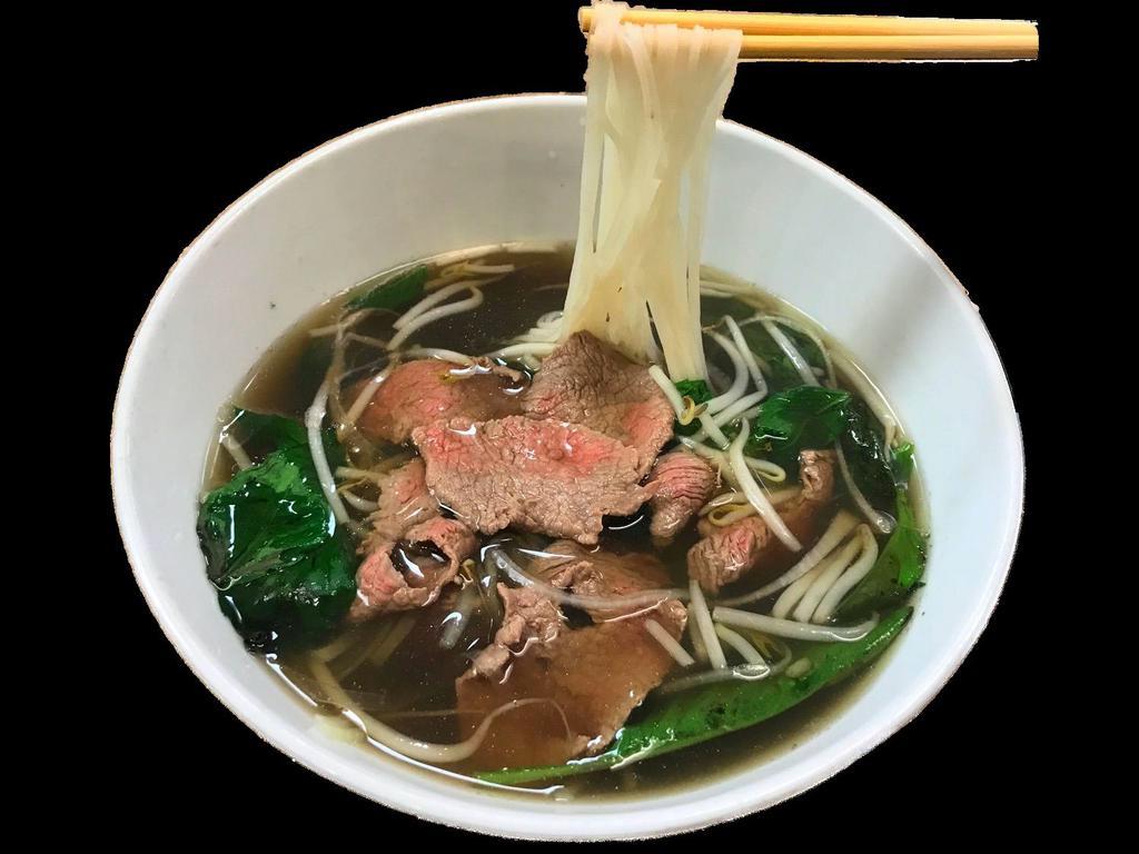 Pho Noodle Soup · Traditional Vietnamese noodle soup with choice of beef or chicken.