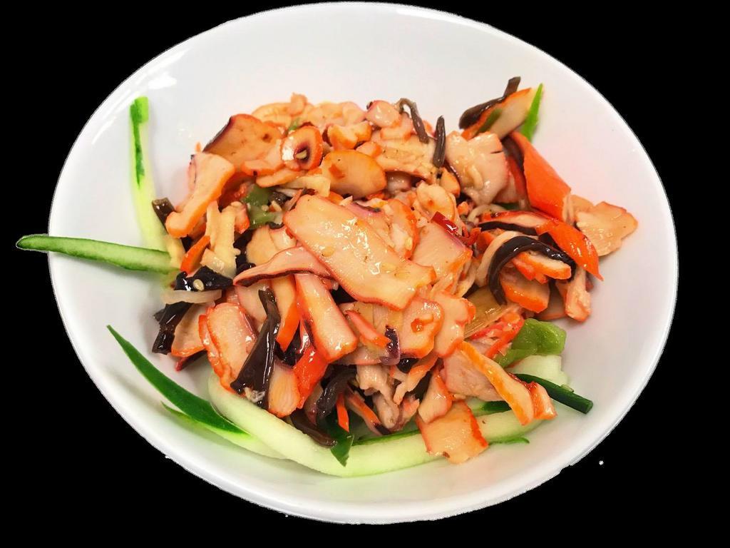 Ika Sansai Salad · Marinated squid served over a bed of cucumber with chef's special sauce.