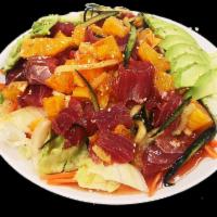Spicy Tuna Salad · Tuna, cucumber, lettuce, avocado and fresh oranges mixed with a spicy kimchee sauce and sesa...