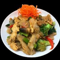 Drunken Noodles · Wide flat rice noodles tossed with basil leaves, tomatoes, baby bok choy, mushrooms, broccol...