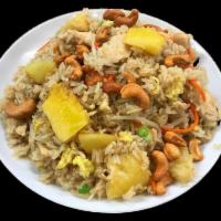 Pineapple Fried Rice · Choice of protein tossed with pineapple, eggs, bean sprouts, carrots, cashew nuts and scalli...