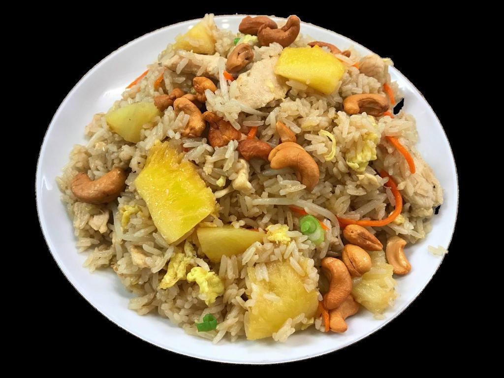 Pineapple Fried Rice · Choice of protein tossed with pineapple, eggs, bean sprouts, carrots, cashew nuts and scallions.