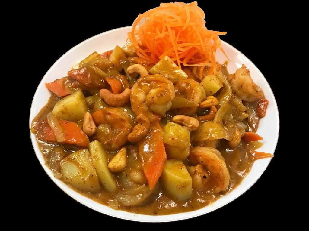 Massaman Curry · A sweet aromatic brown curry with potatoes, onions, carrots and cashew nuts. Served with choice of protein and rice.