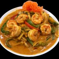 Red Curry · Red curry sauce with bamboo shoots, bell peppers, onions and basil. Served with choice of pr...