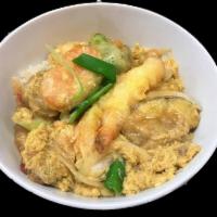 Tendon Tempura Rice Bowl · Shrimp and vegetable tempura served with egg broth, onion slices and
green onions a bowl of ...