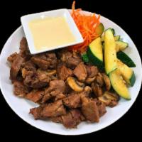Hibachi Beef · Grilled beef with mushrooms and zucchini in a hibachi sauce. Served with choice of rice and ...