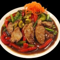 Tamarind Duck · Sliced roasted duck, asparagus, kiwi in a tamarind sauce, garnished with scallions and bell ...