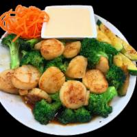 Hibachi Scallop · Grilled with broccoli and zucchini in hibachi sauce. Served with choice of rice and either s...