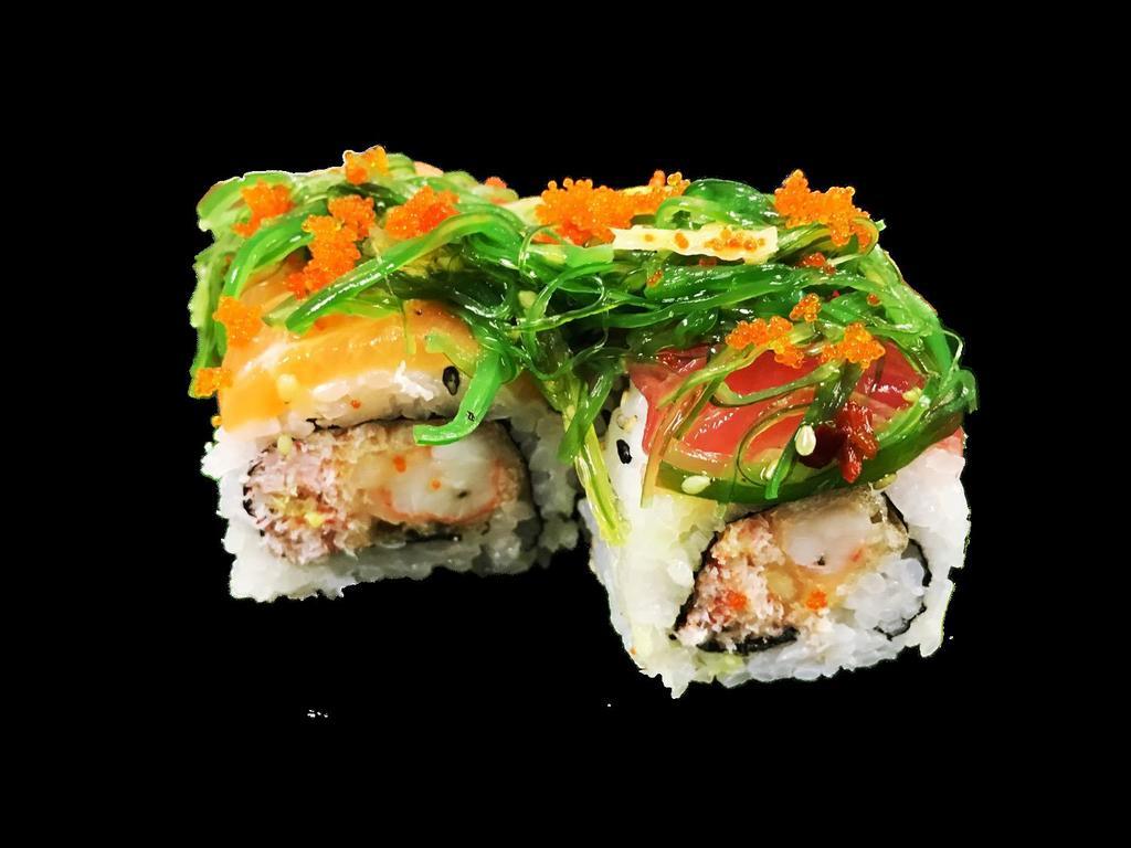 Champion Roll · Shrimp tempura and snow crab topped with salmon, tuna, seaweed salad and masago splashed with wasabi and vinegar sauce.