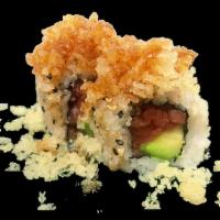 Crunchy Tuna Roll · Spicy tuna and avocado topped with tempura flakes and eel sauce.