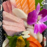 Omakase Sashimi  · 18 pcs Sashimi. 3 pcs yellowtail, 3 pcs Toro tuna, 3 pcs salmon, 2 pcs sockeye salmon,
2 pcs...