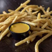Cheese Fries · Served with the Cheese Wiz on the side and 2 sides of fry sauce.