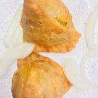 1. Chicken Samosa · Crispy pastry turnover filled with ground chicken.