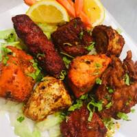 2. Mixed Appetizers · Consists of Seekh kabab, chicken tikka, vegetable pakora and lamb kabab.