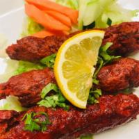 6. Seekh Kabab · Minced lamb with onion from skewers.