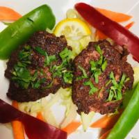 11. Shami Kabab · Shaped minced lamb spiced with herbs.