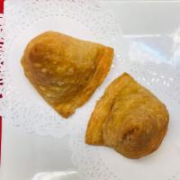 14. Vegetable Samosa · Crispy pastry turnover filled with mixed vegetables and potato.