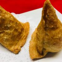 14A. Coconut Samosa · Crispy pastry turnover filled with coconut.
