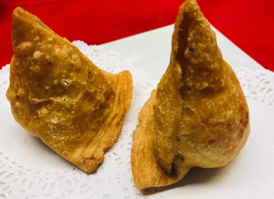 14A. Coconut Samosa · Crispy pastry turnover filled with coconut.