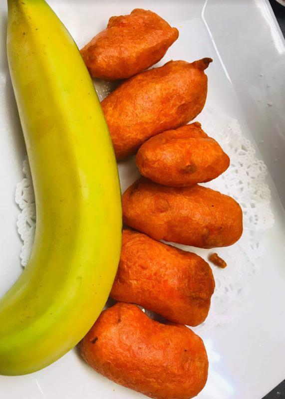 21. Banana Pakora · Fresh banana fritters.