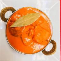62a. Bonless Chicken Tikka Masala (Mild) · Cooked with tomatoes and cream sauce.