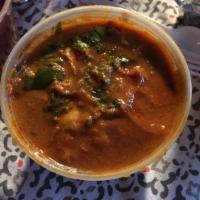 69. Korahi · Cooked with ginger, garlic, coriander and spicy masala sauce.
