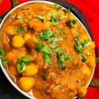 88. Chana Masala · Chickpeas with fresh tomato and onions. Served with basmati rice.