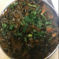 89. Mushroom Saag · Mushroom and spinach cooked in mild spices sauce. Served with basmati rice.