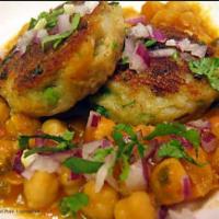Aloo Tikka chat · Spiced, crisp and tasty potato patties served with smattering of various sweet and tangy chu...