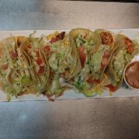  Four Shrimp Tacos Plate · Cheese, lettuce, tomato, Chipotle sauce
