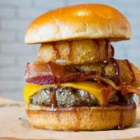 Western BBQ  · BBQ sauce, cheddar cheese, Applewood bacon and crisp onion rings.