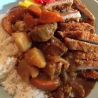 Katsu Curry · Deep fried pork cutlet served with curry sauce.  