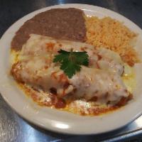 Enchilada de Pollo · Shredded chicken and cheese enchilada topped with melted cheese and your choice of green cre...
