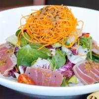 Tuna Sashimi Salad · Seared yellowfin tuna, mix leaves salad, shredded daikon, carrot, and onion dressing.