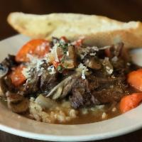 Pot Roast · (Gluten Free). Slow-cooked with carrots, mushrooms, and red onions and served over parmesan ...