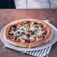 Combo Pizza · The classic Meat and Veggies combination on a Pizza. The Combo Pizza comes with Pepperoni, I...