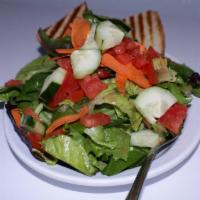 Mixed Greens Salad · Mixed greens, carrots, cucumber, tomato, green onion, balsamic vinaigrette.